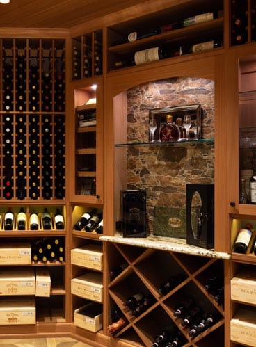 Wooden wine cellar showcasing an elegant display of bottles. Part of the Towers Series' exclusive styles.